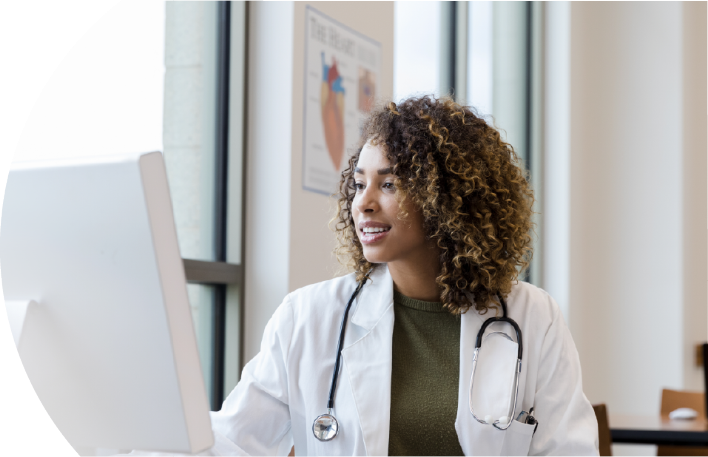 Physician engaging with PC